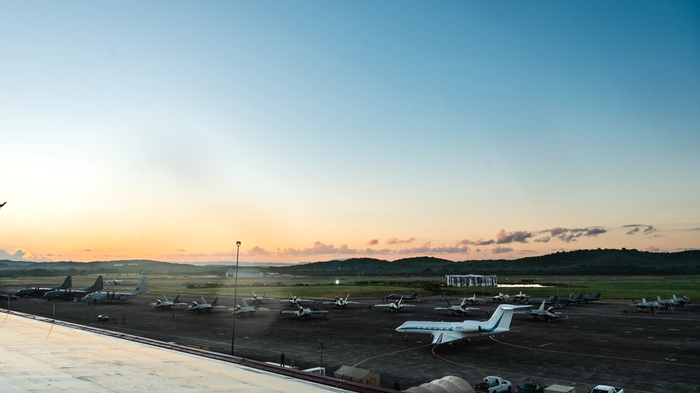U.S. military aircraft are parked at an airship following a military operation conducted in Venezuela to support 'Operation Absolute Resolve.' The operation involved various air forces, including fighter jets and electronic warfare assets. Photo by U.S. Department of Defense (DVIDS)